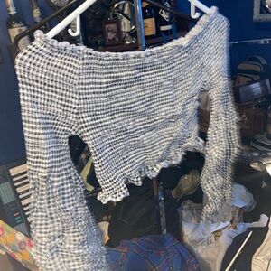 Black and White Off-the-Shoulder Sweater with Cropped Length and Long Sleeves